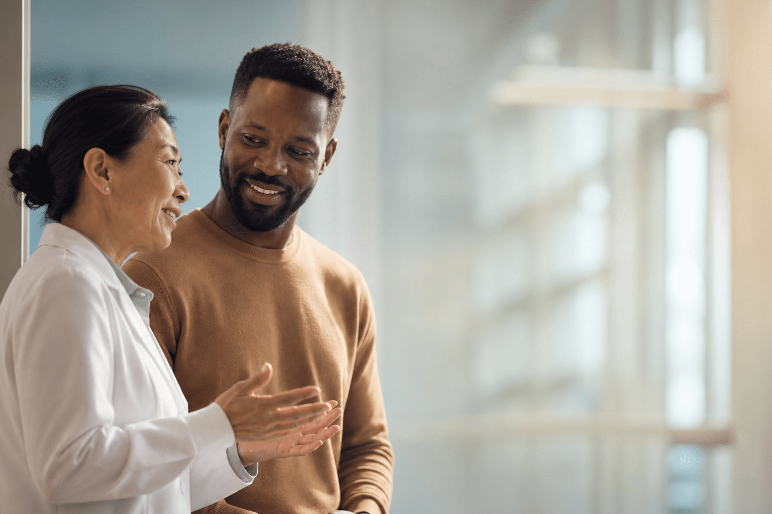 Illustrative clinician and patient conversation, not Navelia staff or an actual patient