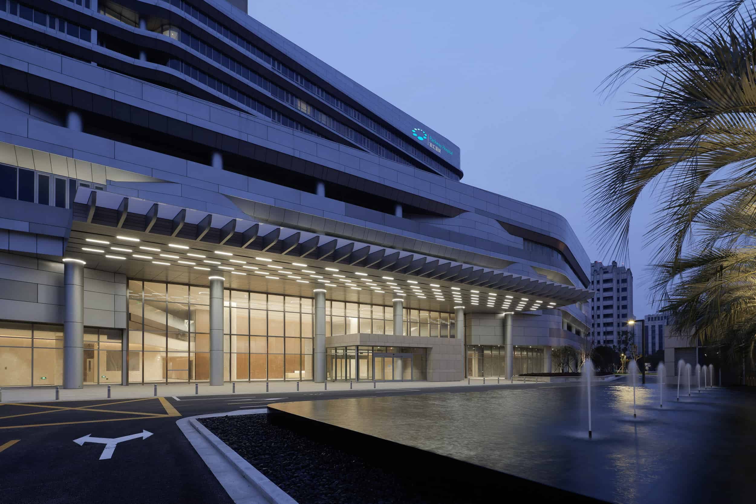 Parkway Shanghai Hospital entrance at dusk, Jile Road, Minhang